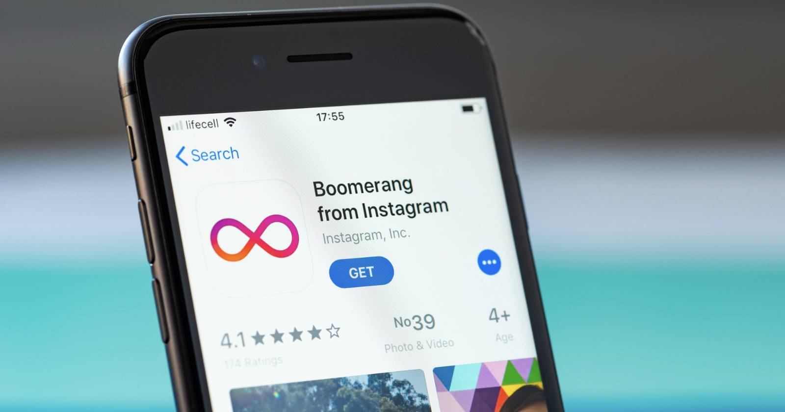 A smartphone screen displays the App Store page for Boomerang from Instagram, featuring the app icon and a GET button. The app has a rating of 4.1 stars from 174 ratings and is categorized as photo and video.