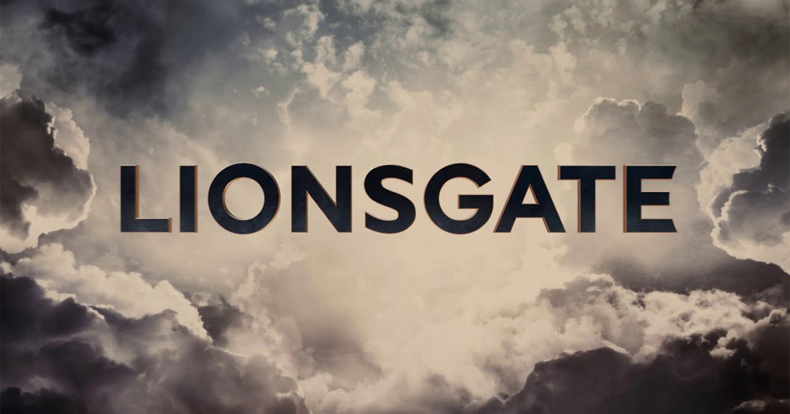 The word LIONSGATE in bold, dark letters is centered against a dramatic sky background with clouds and rays of light shining through.