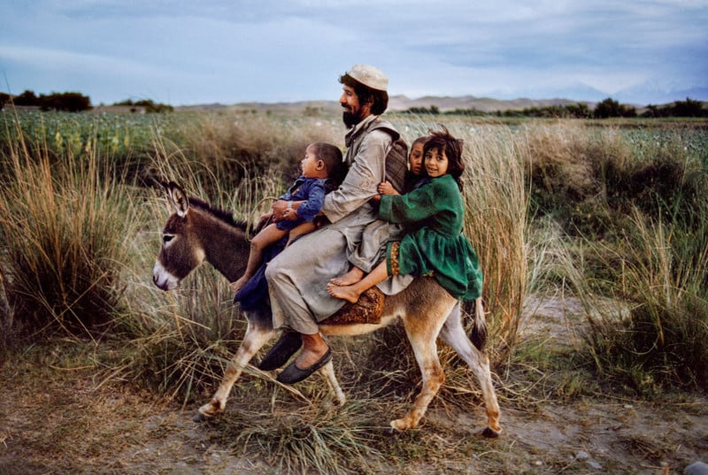 00094_15, Maimana, Afghanistan, 2003, AFGHN-12369. CAPTION: Family Rides a Donkey. Maimana, Afghanistan, 2003. MAX PRINT SIZE: 30X40 IG: This father in Northern Afghanistan takes his children home from a trip to the market. 01/08/2015 - ARCHIVED 01/01/2017 - ARCHIVED There is evidence that this ancient town was inhabited as early as the 12th century BCE. MCS2003005K102, NYC65651 final print_perugia final print_MACRO final print_Sao Paulo Fine Art Print A Life in Pictures_Bonnie Book Final Select PG. 83 final print_Animals (PG. 32) Animals_book retouched_Sonny Fabbri 03/09/2017, Sam Wallander 5/15/2018, Frank Carbonari 11/12/2018