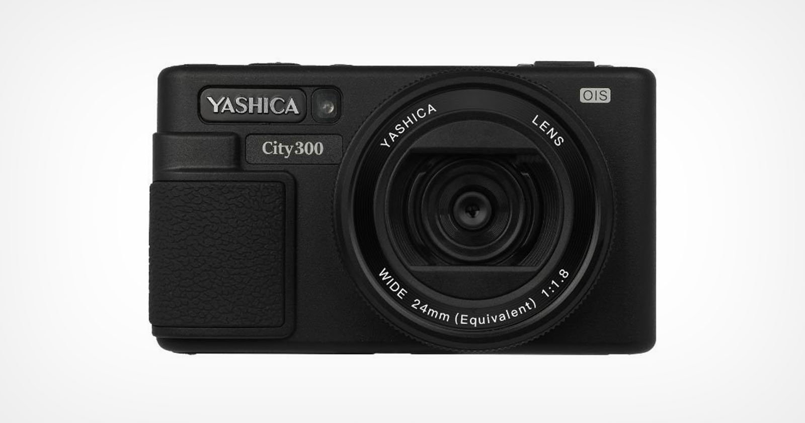 A black Yashica City300 digital camera with a large lens, textured grip, and labeled buttons, shown facing forward against a plain white background.