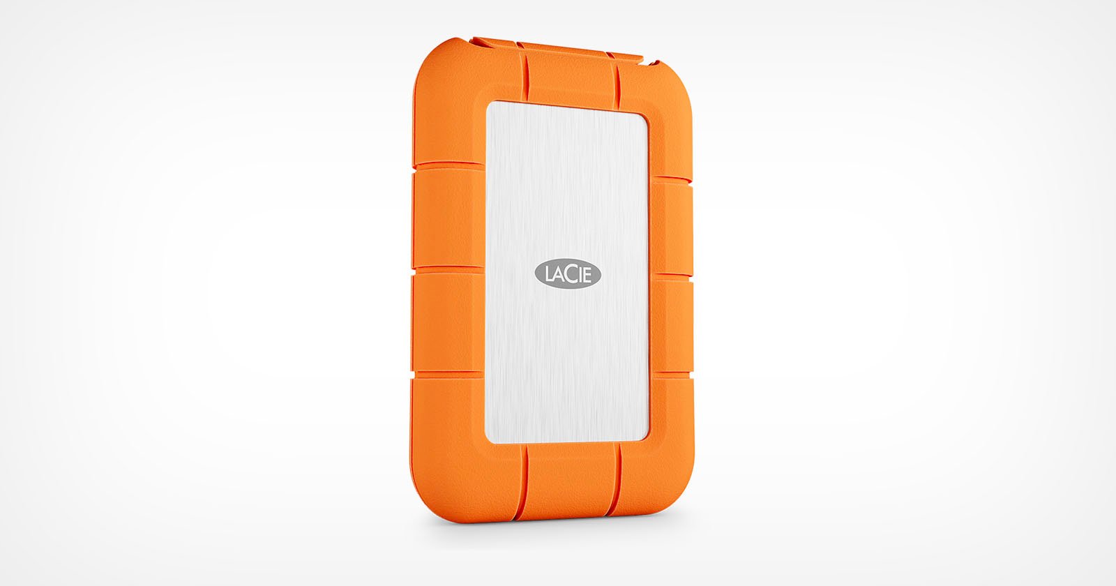 A portable LaCie external hard drive with a silver center and bright orange rugged rubber casing, shown standing upright on a white background.