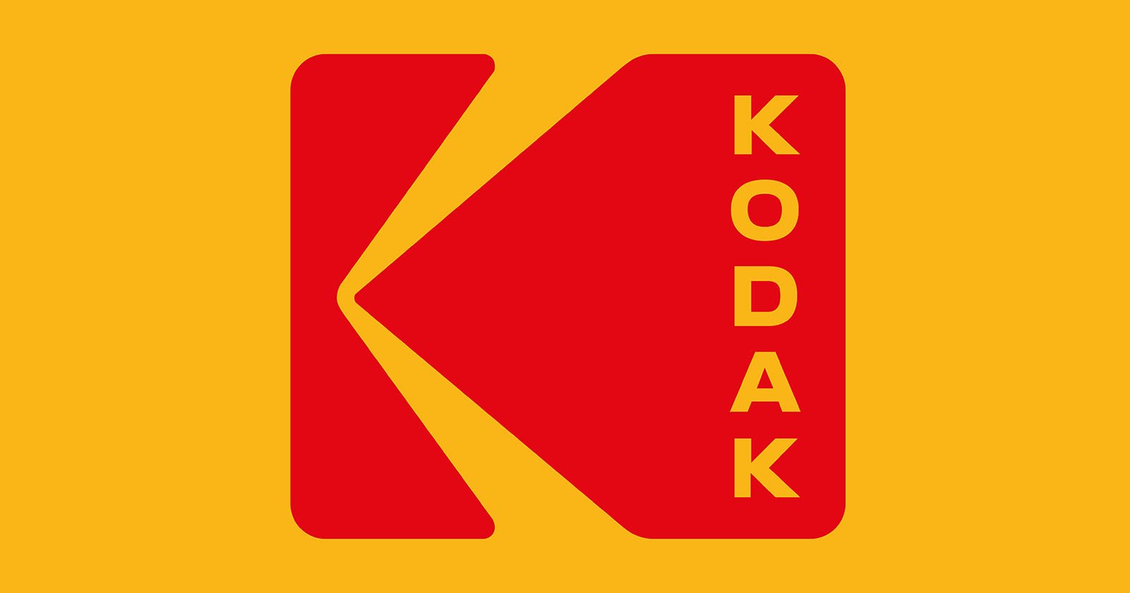 Red Kodak logo with a stylized K on a yellow background; the word “KODAK” appears vertically in yellow letters on the right side of the logo.