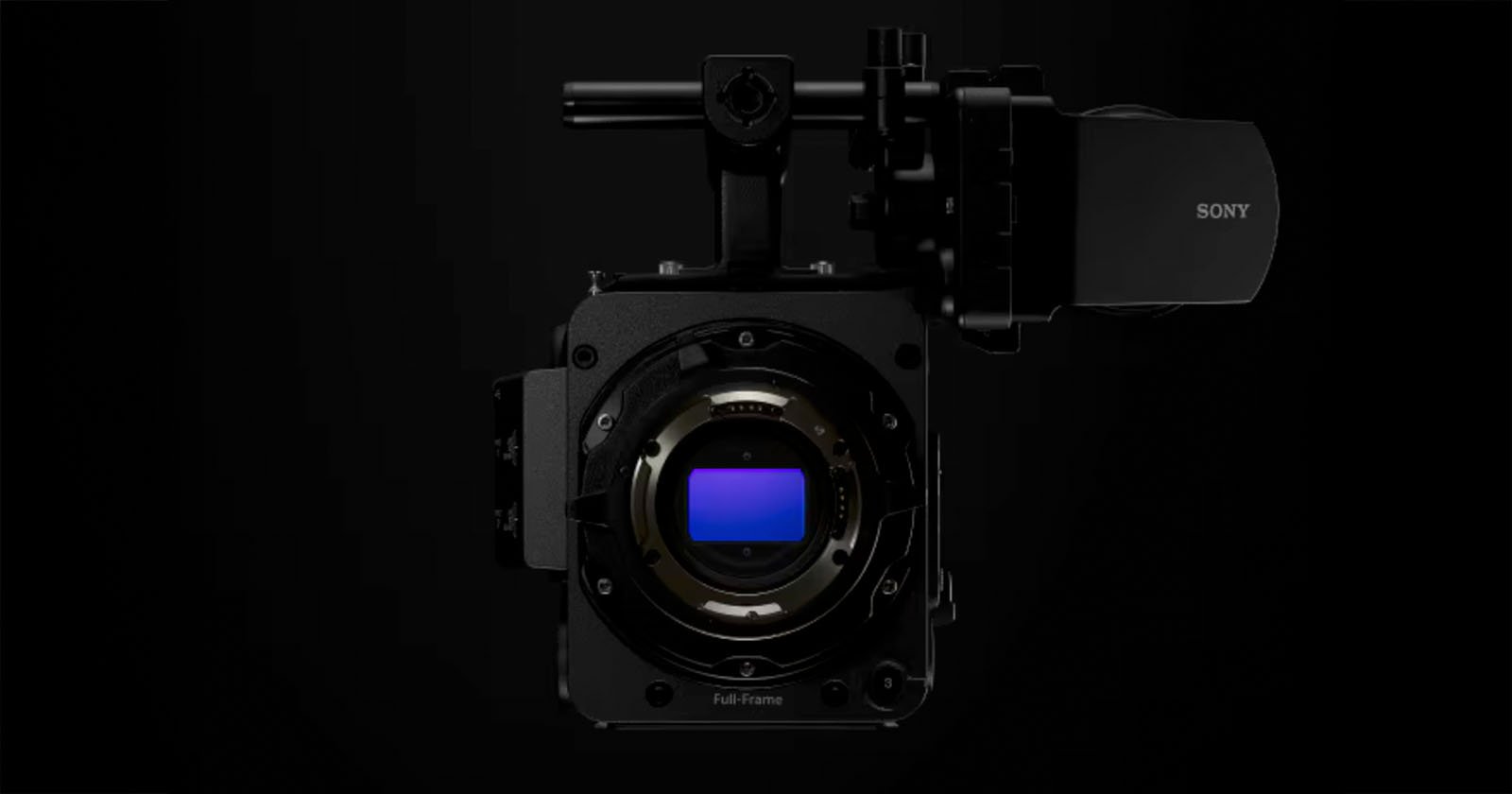A Sony digital cinema camera body is shown head-on against a black background, highlighting its large full-frame sensor and lens mount with various controls visible.
