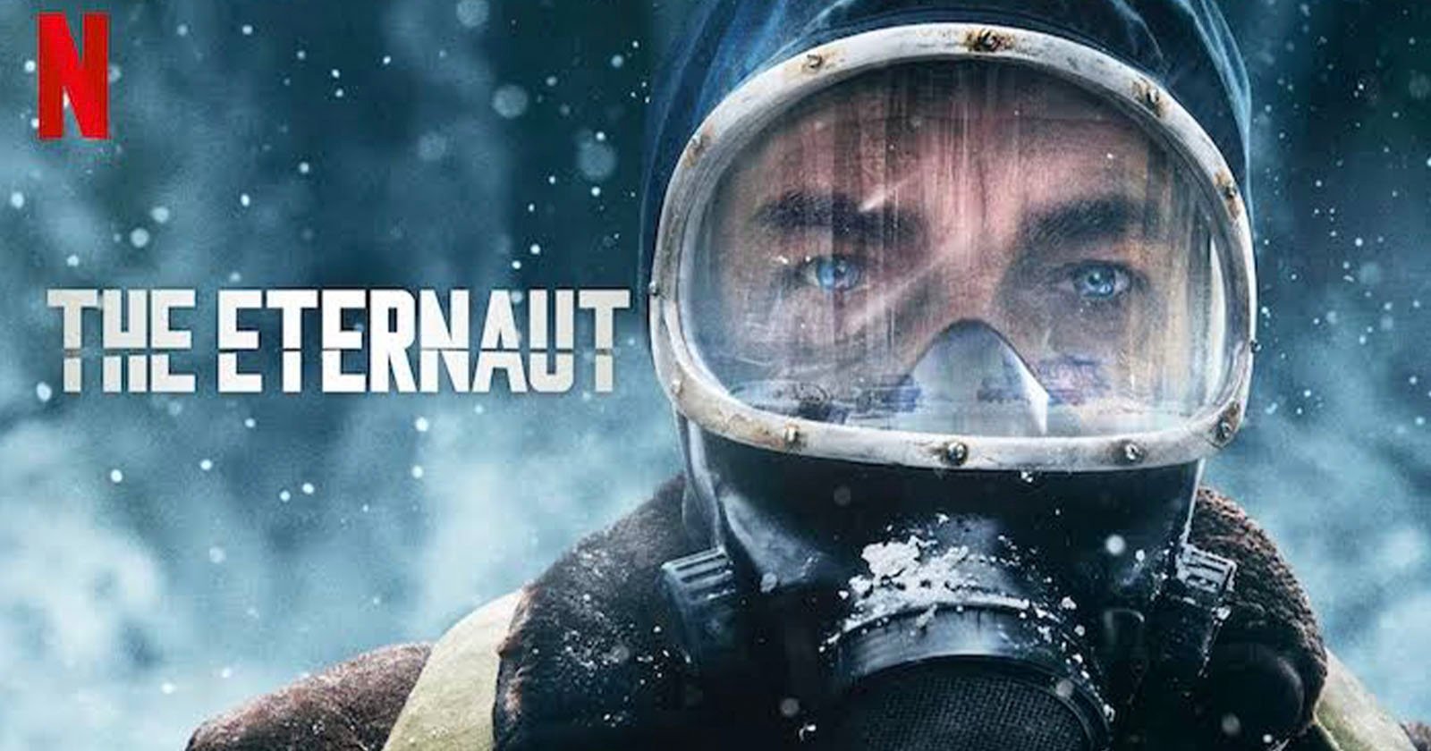 Close-up of a person wearing a gas mask and hooded coat with snow falling, against a snowy background. Text reads The Eternaut with the Netflix logo in the top left corner.