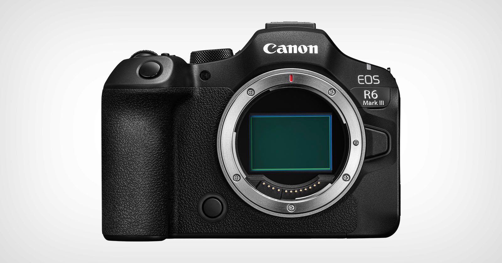 A black Canon EOS R6 Mark II mirrorless digital camera body, shown from the front with the lens removed, revealing the camera sensor.