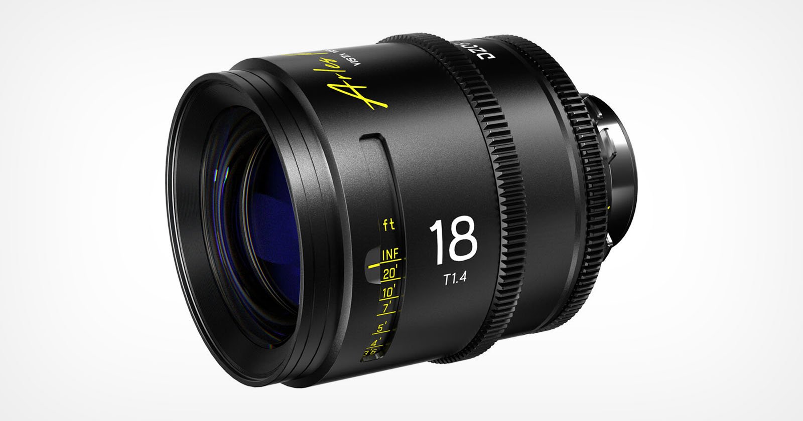 A close-up view of a black camera lens labeled “18 T1.4” with yellow markings for focus distances and a gear ring for follow focus, set against a plain white background.