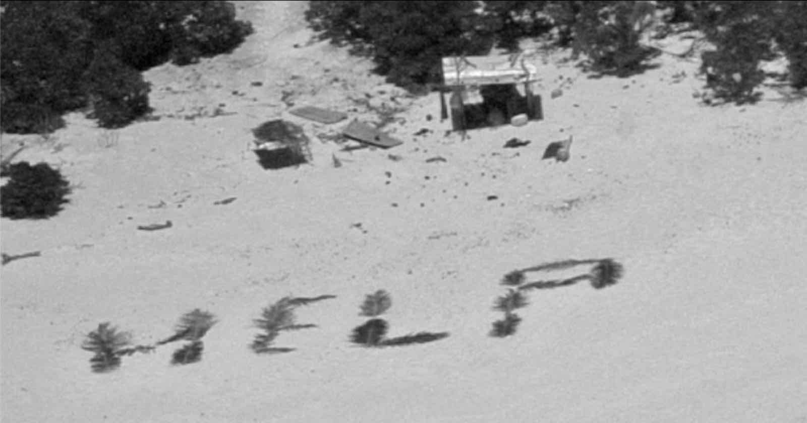 Three Stranded Men Rescued After Navy Plane Photographed 'HELP' Sign on Beach