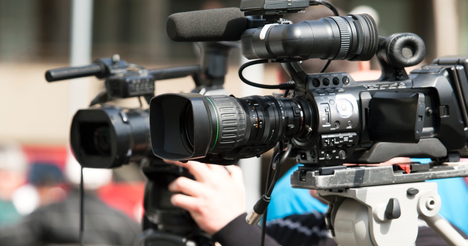A photographer and a reporter in a television news crew were robbed at gunpoint in Chicago — while they were reporting on a string of robberies in the city.