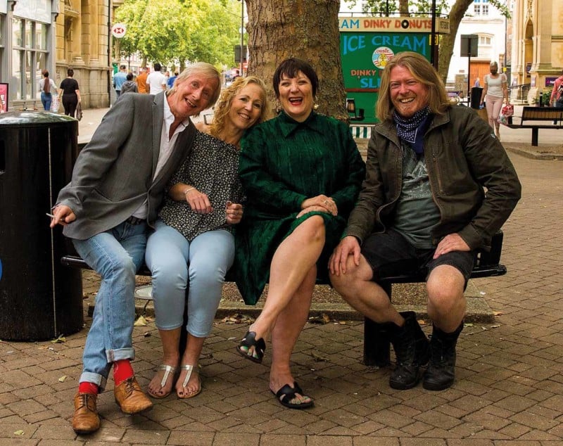 A group of friends sitting on a bench