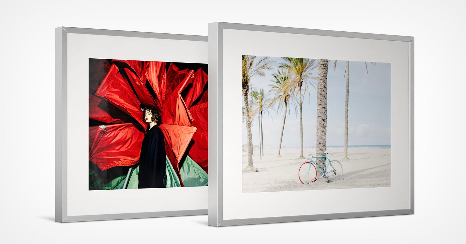 Two framed photographs side by side. The left frame features an abstract photo of a person standing against a vivid backdrop of large red petals. The right frame displays a serene beach scene with tall palm trees and a light blue bicycle on sandy ground.