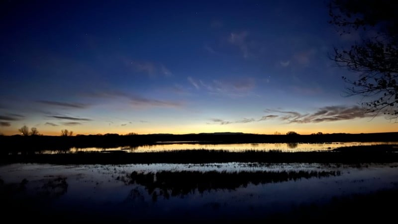 A nighttime photograph of a landscape captured with the iPhone's Night Mode