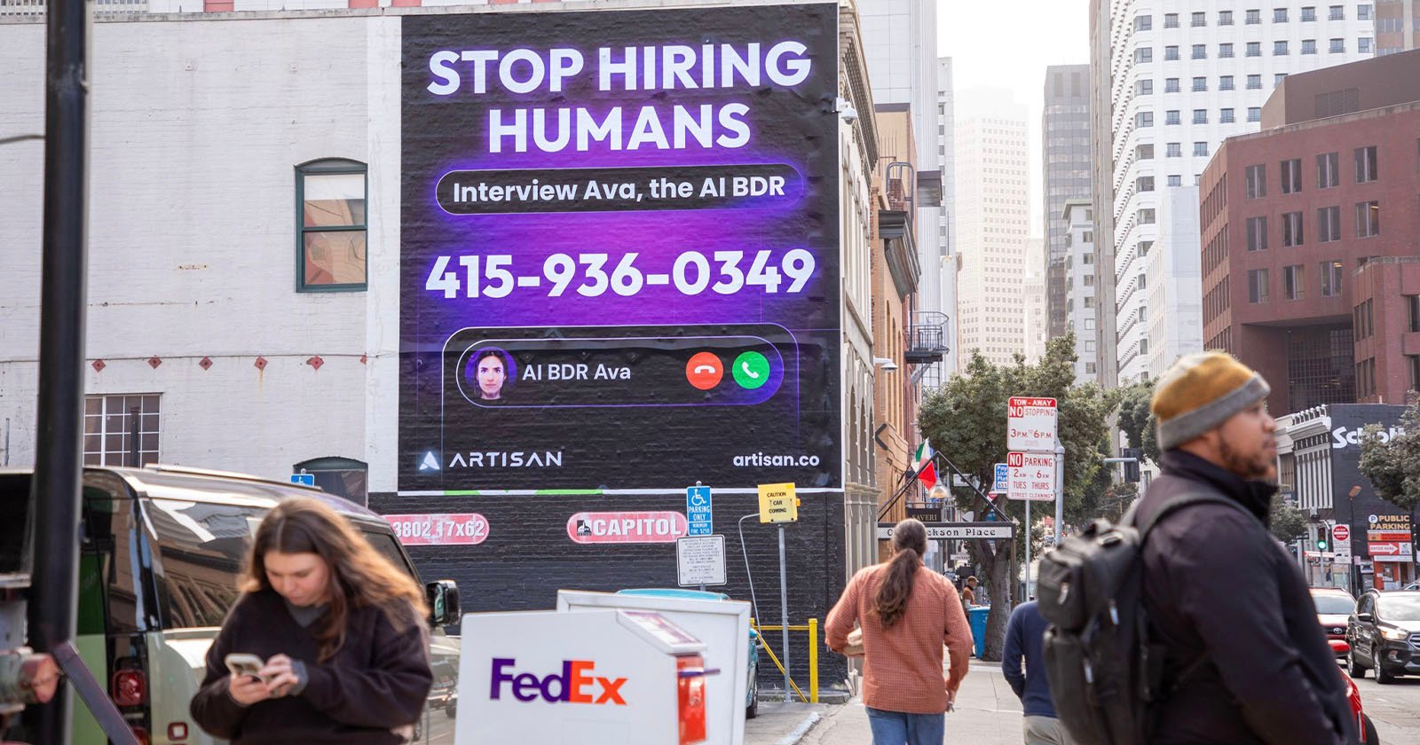 A busy city street features a large advertisement on a building. The ad reads STOP HIRING HUMANS. Interview Ava, the AI BDR with a phone number and an image of a virtual assistant interface. Pedestrians and cars are in the foreground.