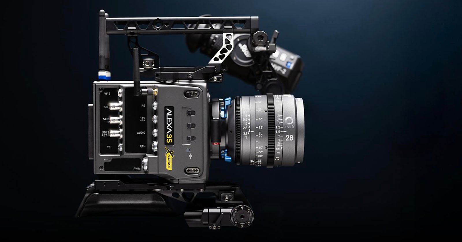 A professional ARRI ALEXA 35 cinema camera mounted in a black metal rig with various controls and a large lens, set against a dark gradient background.