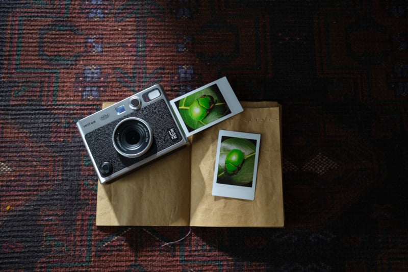 Instax mini Evo next to two photo examples