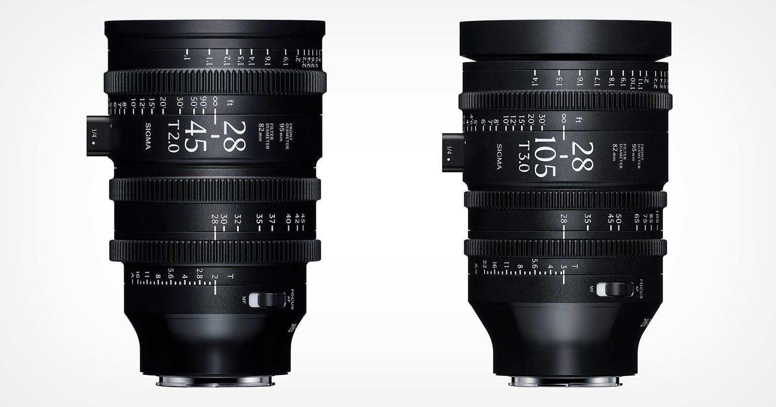 Two professional black camera lenses with white text and measurement markings are shown upright against a white background. The lens on the left is labeled 28-45mm T2.0, and the lens on the right is labeled 28-105mm T3.0.