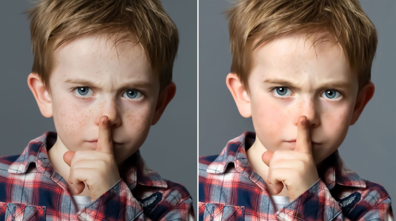 serious 6-year old boy with red hair and freckles asking for silence with his finger on lips, frowning to act like a teacher, grey background