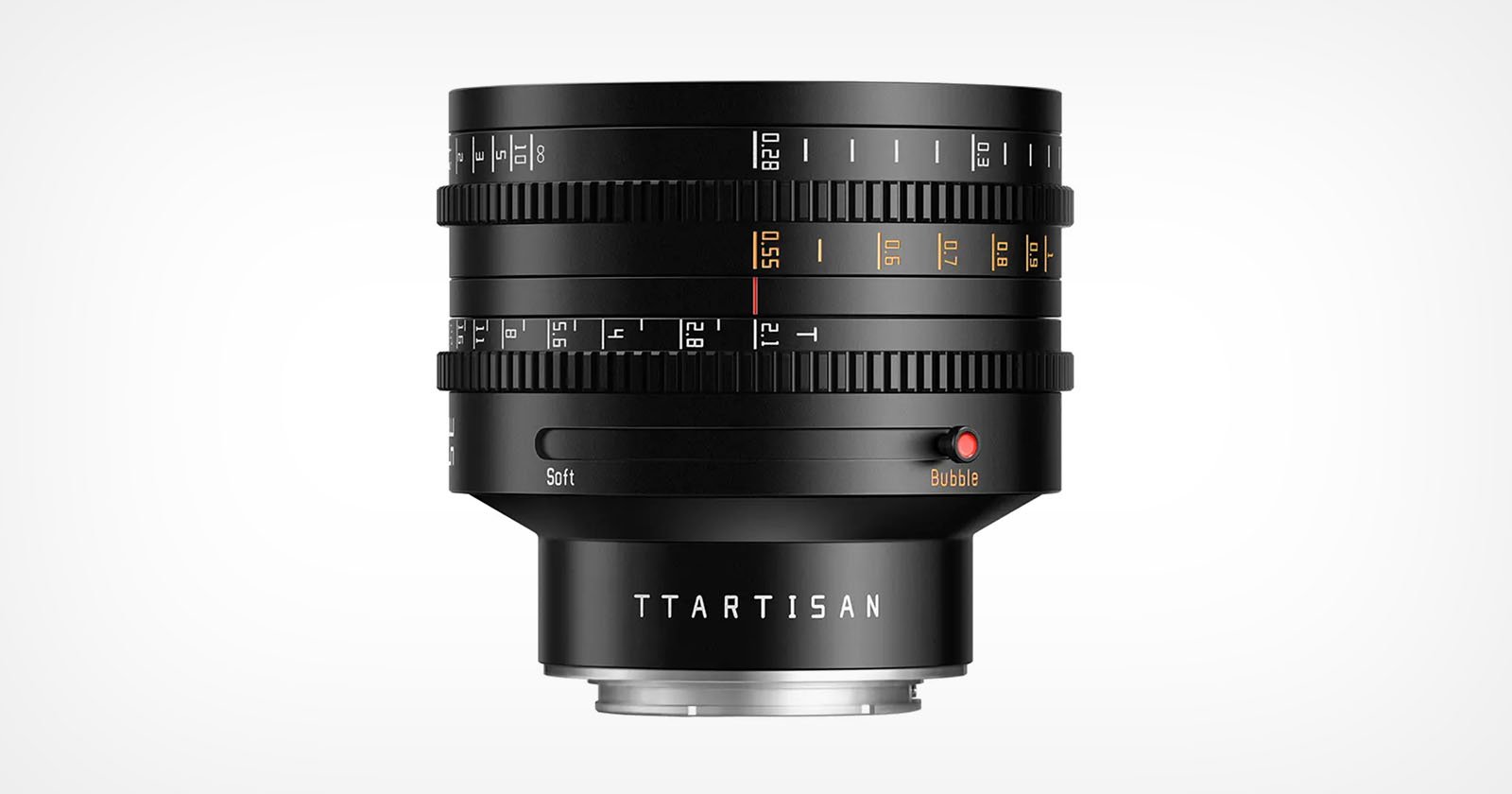 A black TTArtisan camera lens with multiple focus and aperture rings, engraved distance and aperture markings, a soft/hard switch, and a red button, shown against a plain white background.