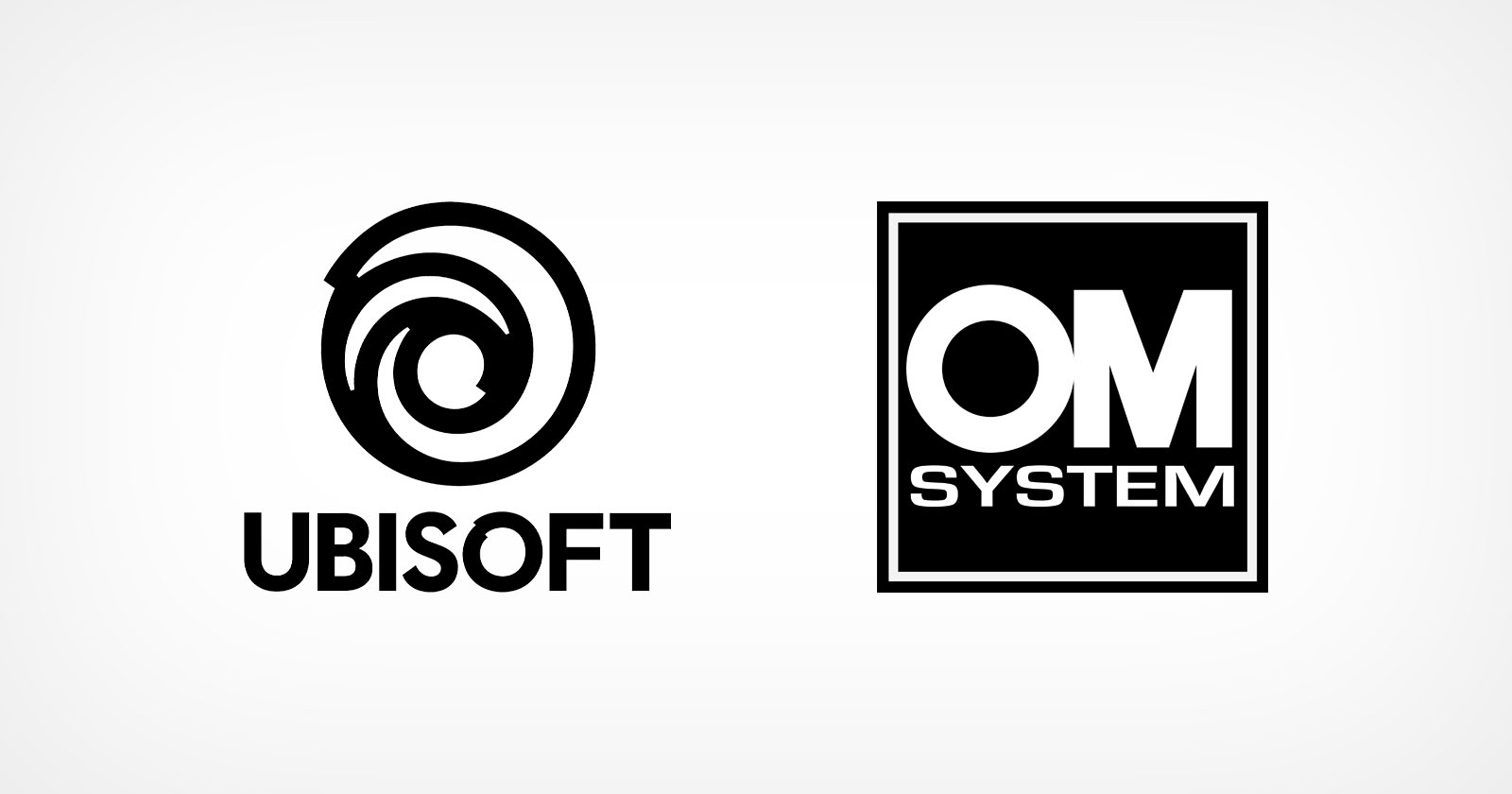 Two logos on a white background: the left logo is the Ubisoft spiral emblem accompanied by the text UBISOFT. The right logo is a square containing the letters OM above the word SYSTEM in bold font.