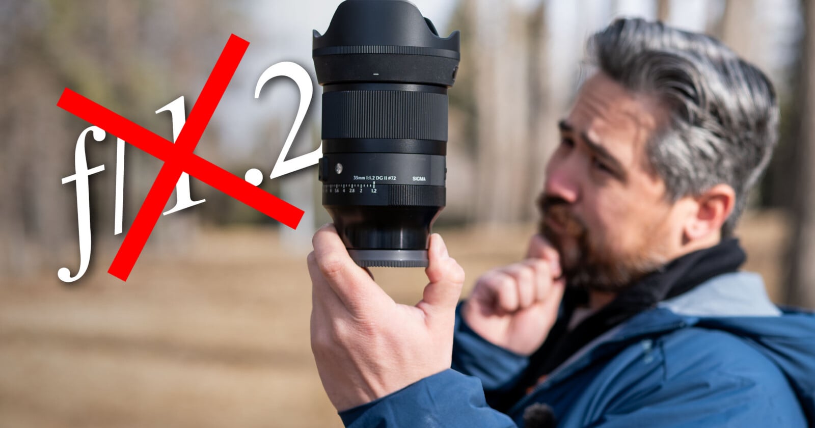 A man in a blue jacket holds up a large camera lens outdoors, examining it thoughtfully. Next to him, the text f/1.2 is shown with a large red X crossing it out.