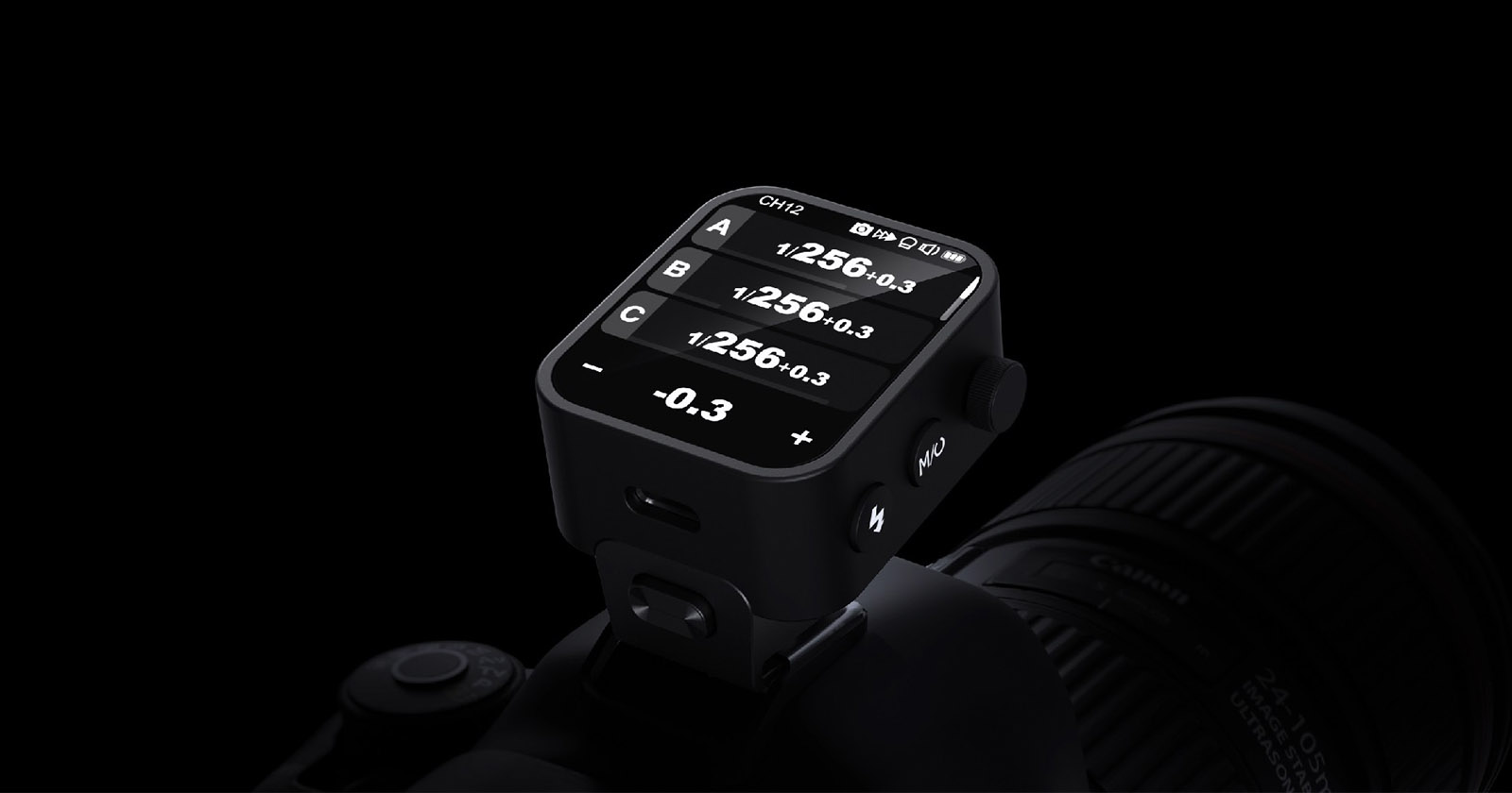 The Flashpoint R2 Nano flash trigger sits on a camera in front of a black background.