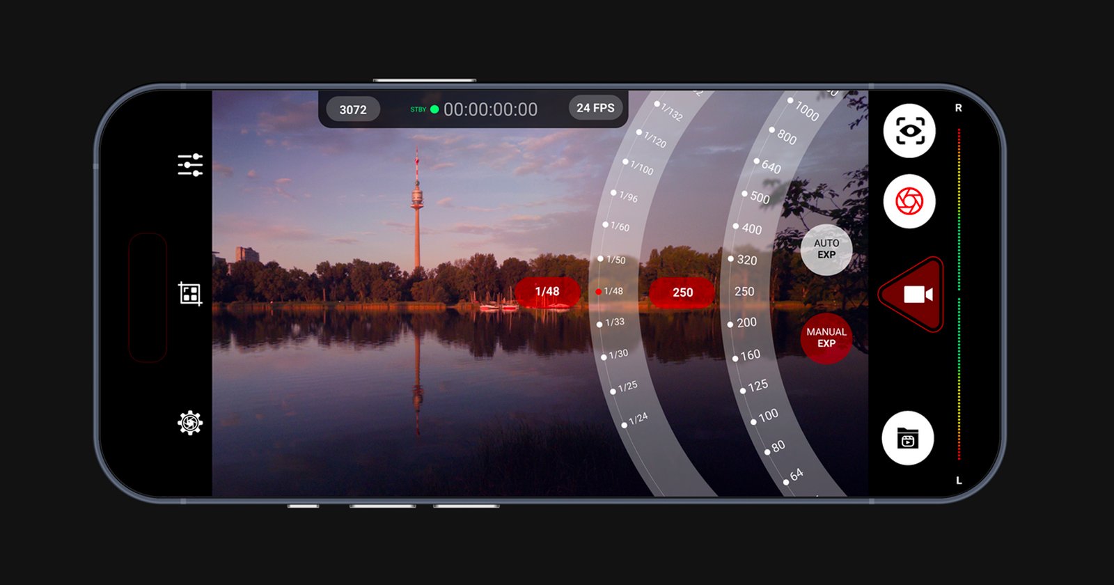 A smartphone screen displays a camera app interface with manual controls, showing a landscape photo of a lake, trees, and a tall tower at sunset, with various exposure and focus settings overlaid.