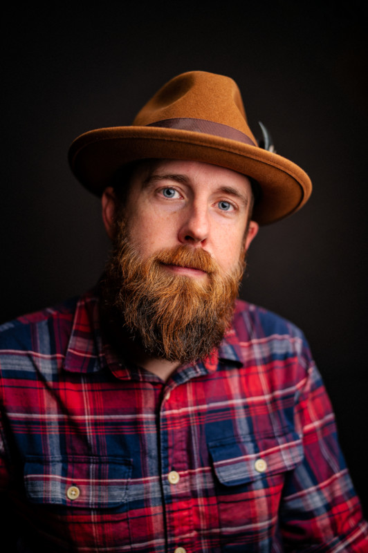 A portrait of a bearded man