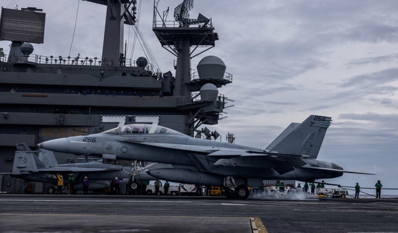 Photographing Navy's 2021 uniform on an aircraft carrier