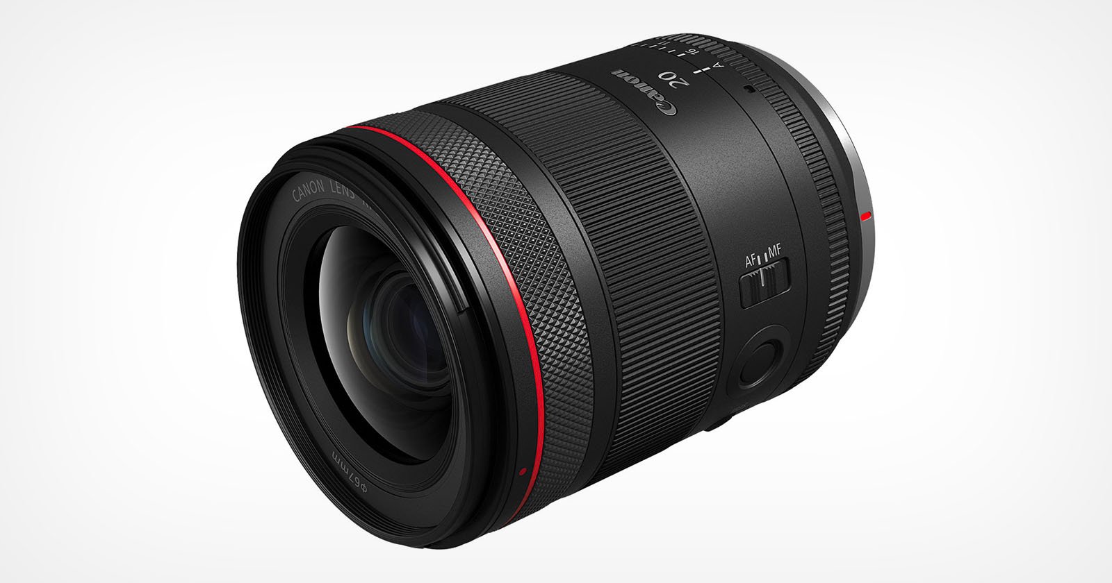 A black camera lens with a red ring near the front. It has textured grip sections, and switches labeled “AF/MF” and “IS”. The front reads 20 and other markings. The lens is angled slightly to the left.
