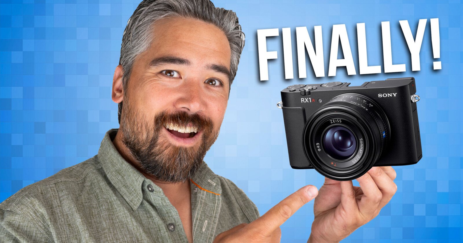 A smiling man with gray hair and a beard points to a Sony RX1 camera with the word FINALLY! in bold white letters on a blue pixelated background.