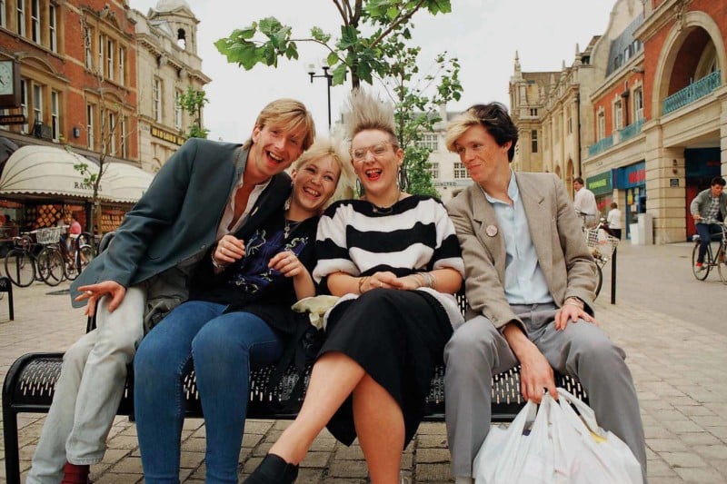 A group of friends sitting on a bench