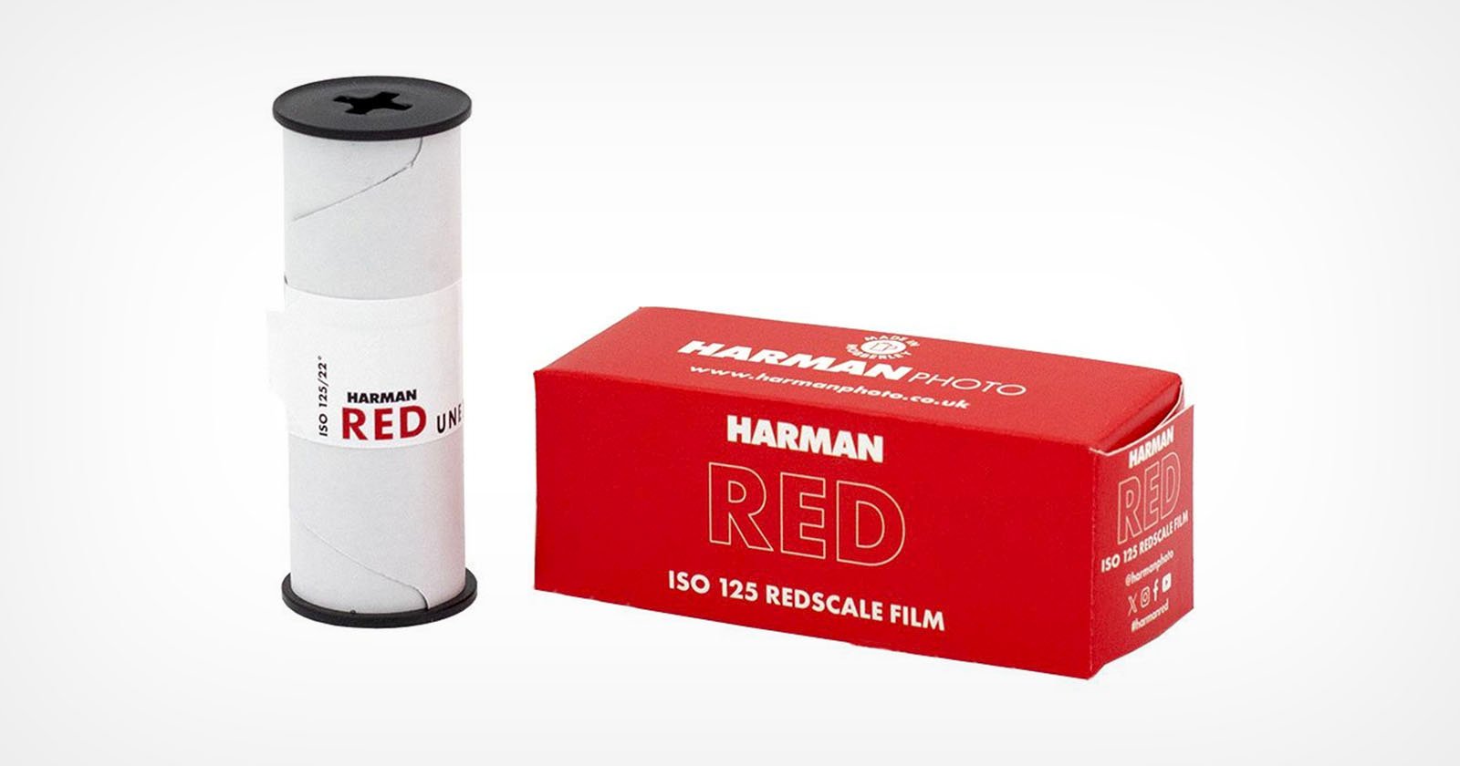 A Harman RED ISO 125 redscale film roll stands beside its red and white box labeled Harman Photo RED, ISO 125 Redscale Film on a plain white background.