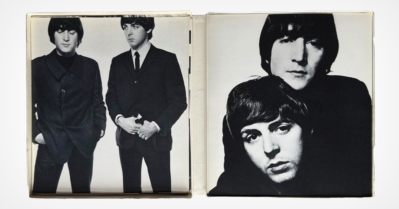 Black-and-white photos of two men on an open album: the left side shows them standing together in suits, and the right side shows close-up portraits of their faces, one resting his chin on the other’s head.