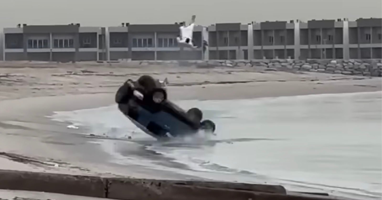 Man is flung from vehicle on a beach