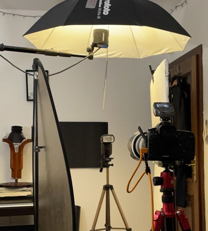 A behind the scenes photo showing how a black on black photo was shot A behind the scenes photo showing how a black on black photo was shot