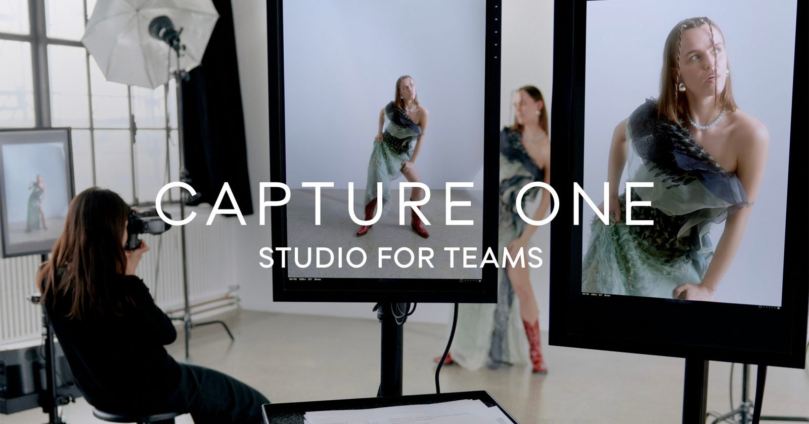 A photographer works in a studio, using a camera and digital screens to capture images of a model posing in stylish outfits. The text CAPTURE ONE STUDIO FOR TEAMS overlays the image. The scene is well-lit and features professional photography equipment. A photographer works in a studio, using a camera and digital screens to capture images of a model posing in stylish outfits. The text CAPTURE ONE STUDIO FOR TEAMS overlays the image. The scene is well-lit and features professional photography equipment.