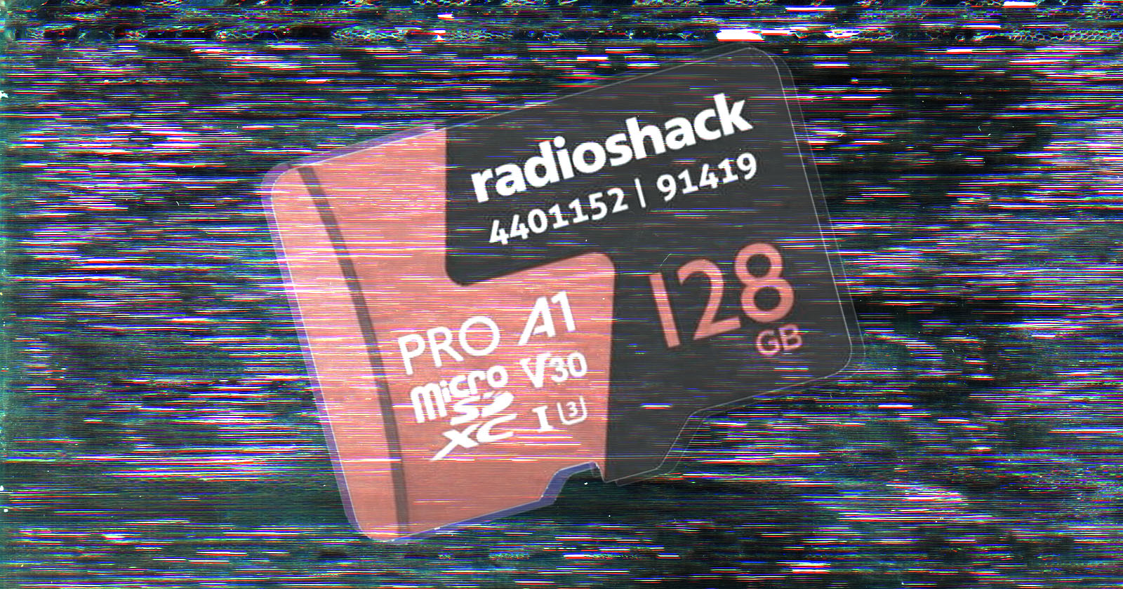 A distorted image of a RadioShack 128 GB microSD card. The card has text indicating PRO A1, microSD, V30, XC, and U3. Background features static interference lines. A distorted image of a RadioShack 128 GB microSD card. The card has text indicating PRO A1, microSD, V30, XC, and U3. Background features static interference lines.