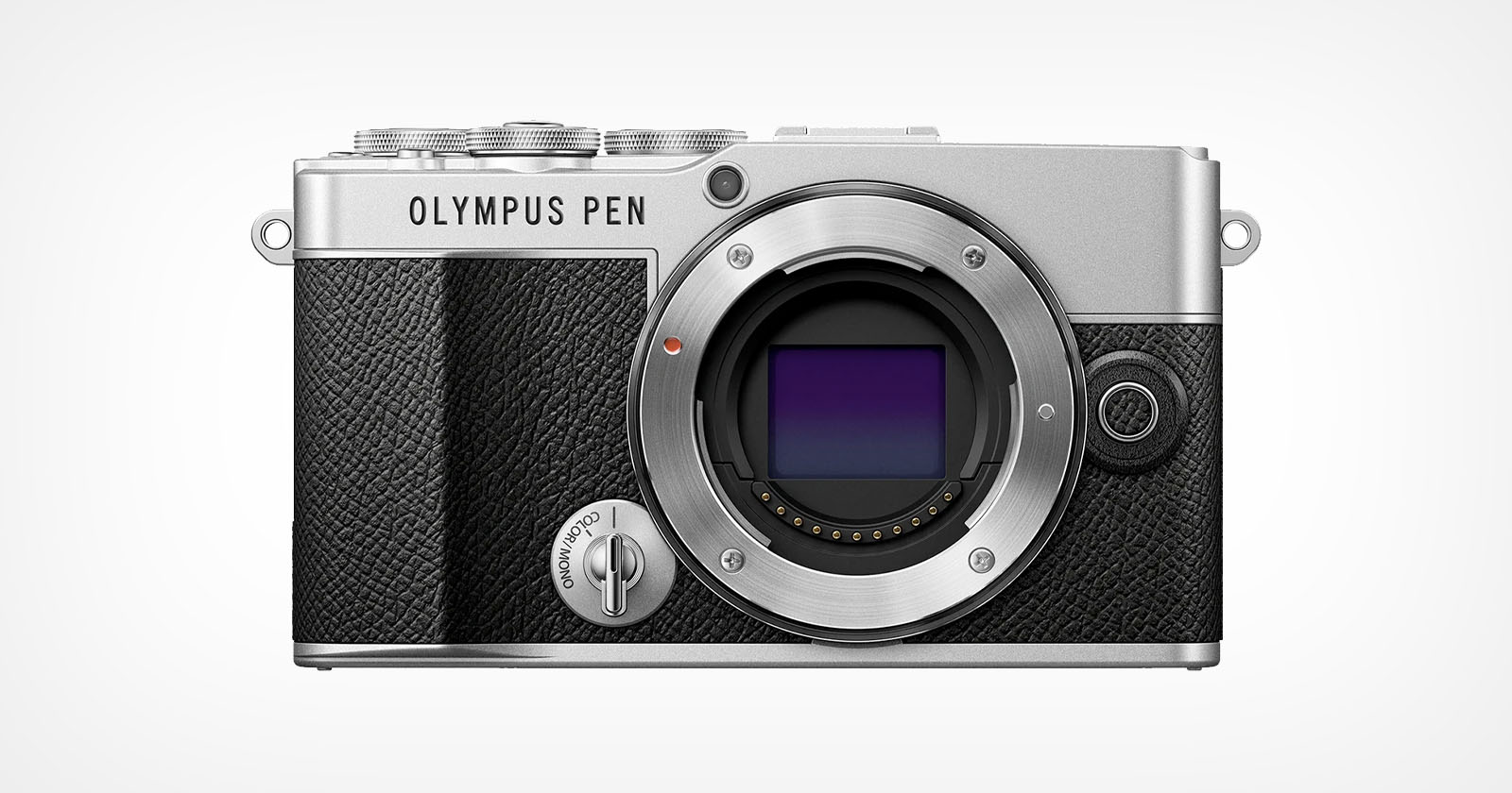 A front view of an Olympus PEN camera body with a vintage design. The camera is silver with black textured grips. The lens mount is exposed, showing the sensor. The camera features dials on the top for adjustments. A front view of an Olympus PEN camera body with a vintage design. The camera is silver with black textured grips. The lens mount is exposed, showing the sensor. The camera features dials on the top for adjustments.