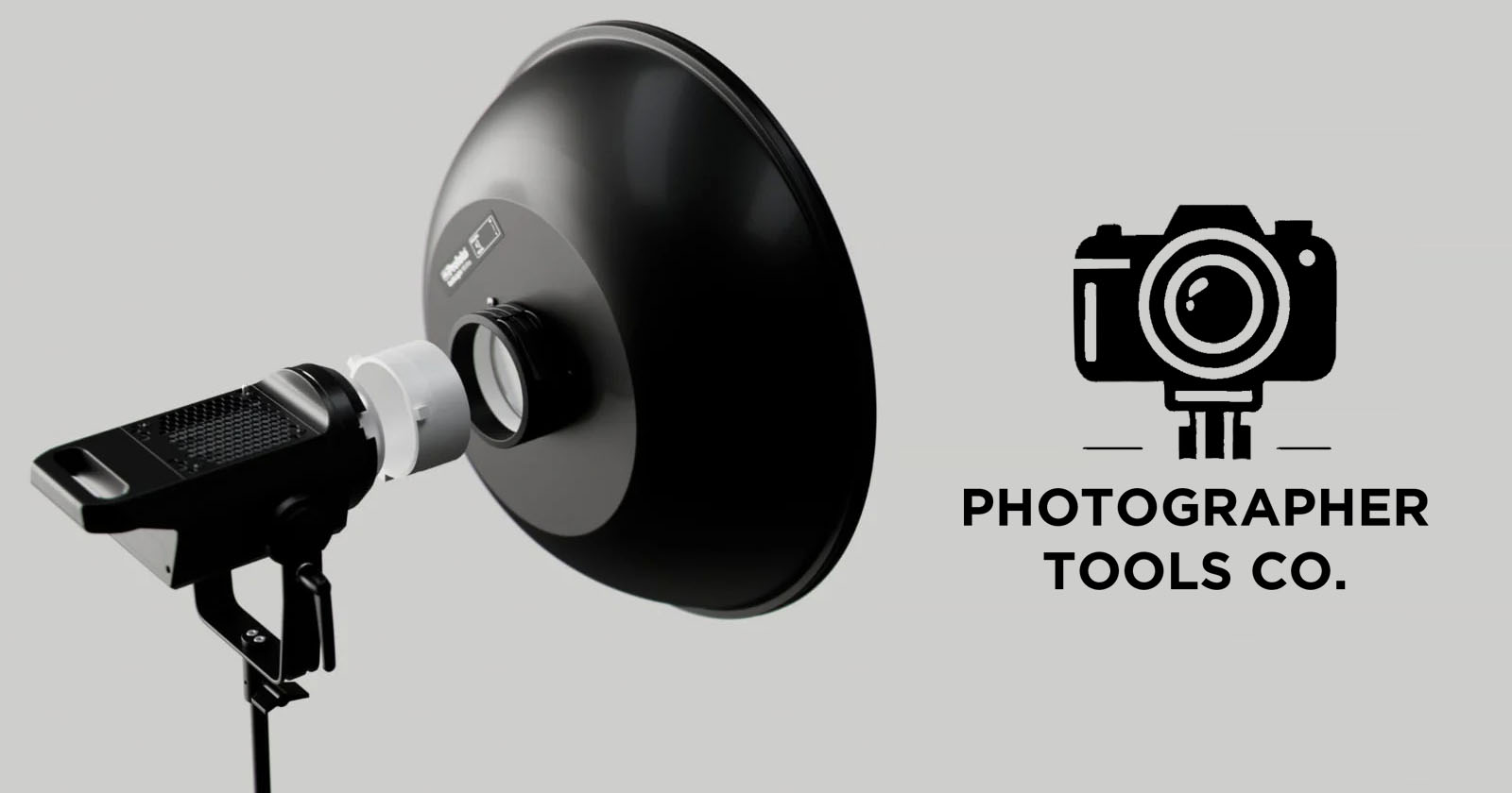 A black studio light with a reflector dish is positioned on the left. On the right, there is a camera logo and the text Photographer Tools Co. on a light gray background. A black studio light with a reflector dish is positioned on the left. On the right, there is a camera logo and the text Photographer Tools Co. on a light gray background.