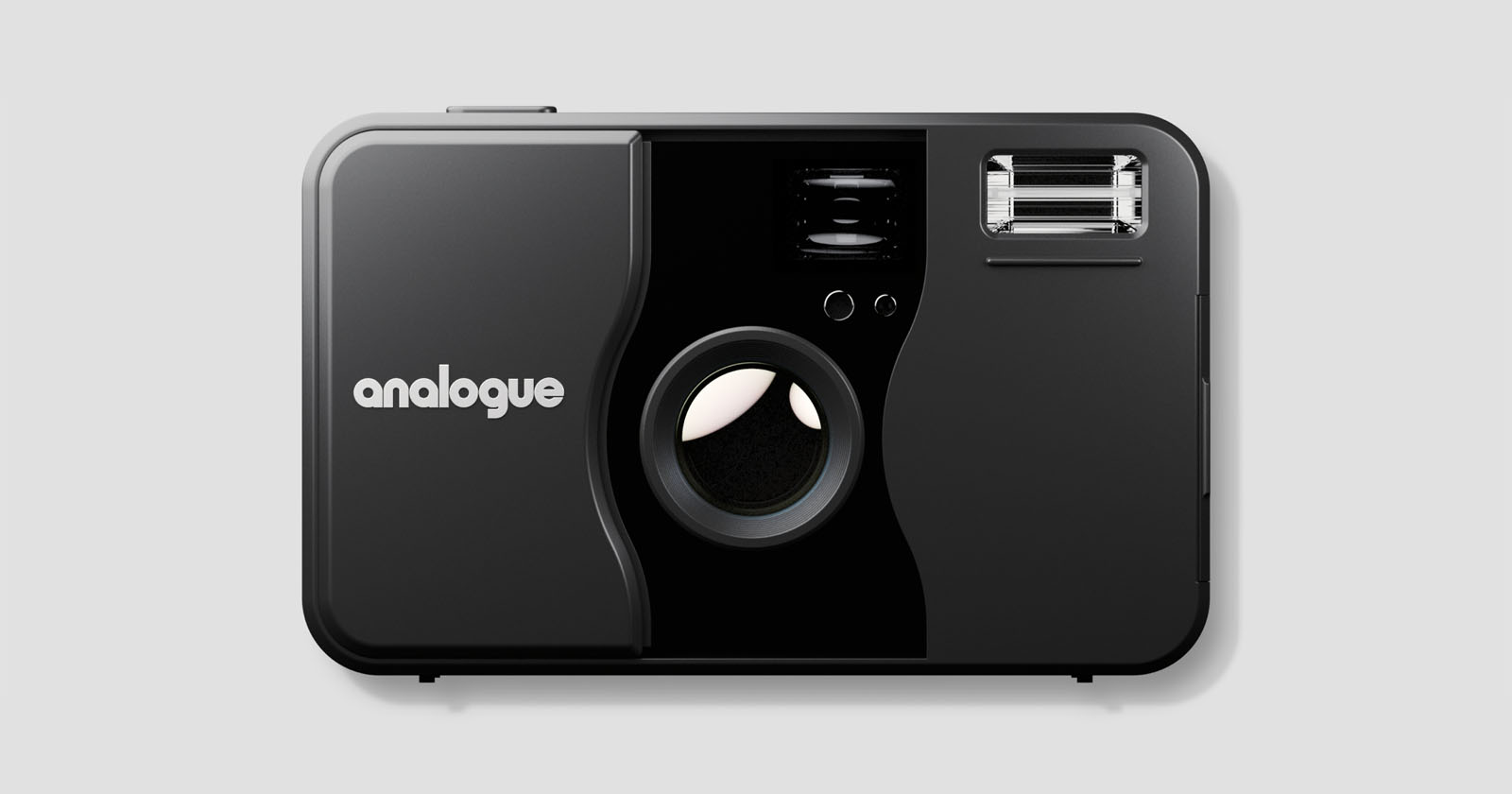 A black analogue film camera with a large lens in the center, a flash in the upper right corner, and the word analogue printed in white on the left side. The camera is shown against a plain gray background. A black analogue film camera with a large lens in the center, a flash in the upper right corner, and the word analogue printed in white on the left side. The camera is shown against a plain gray background.
